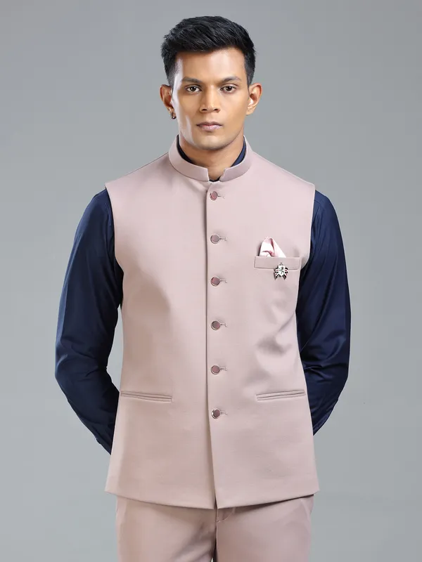 Festive fresh look with peach waistcoat for men