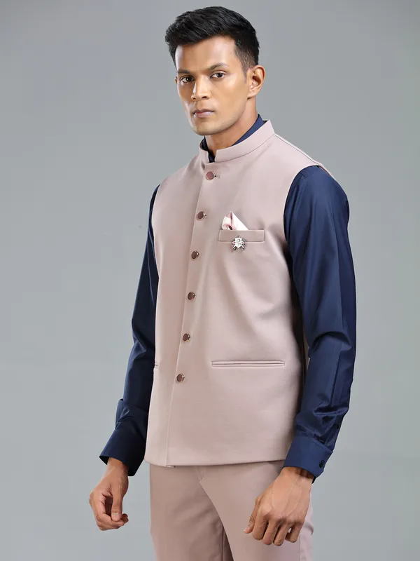 Festive fresh look with peach waistcoat for men