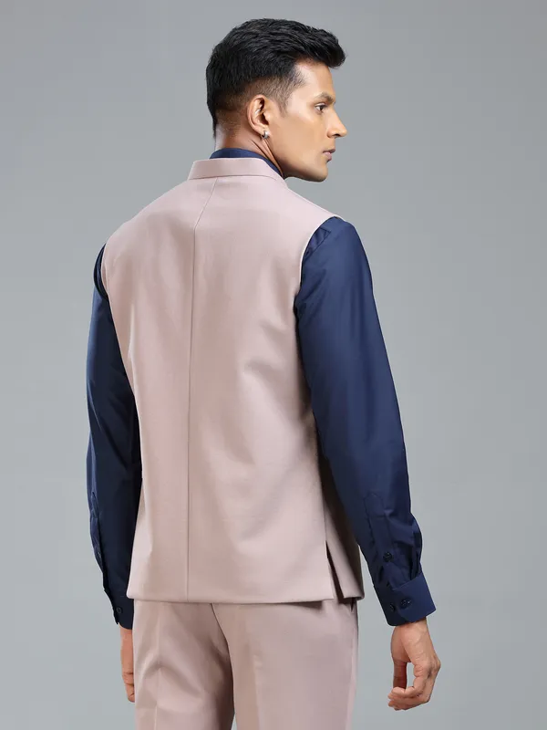 Festive fresh look with peach waistcoat for men