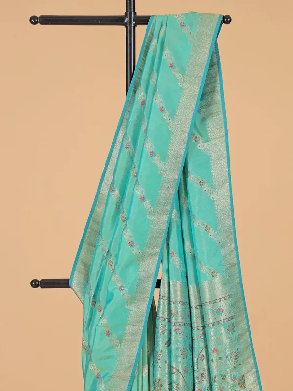 Festive style aqua silk saree