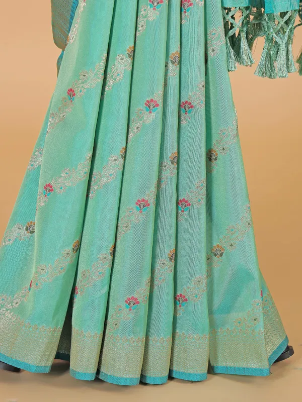 Festive style aqua silk saree