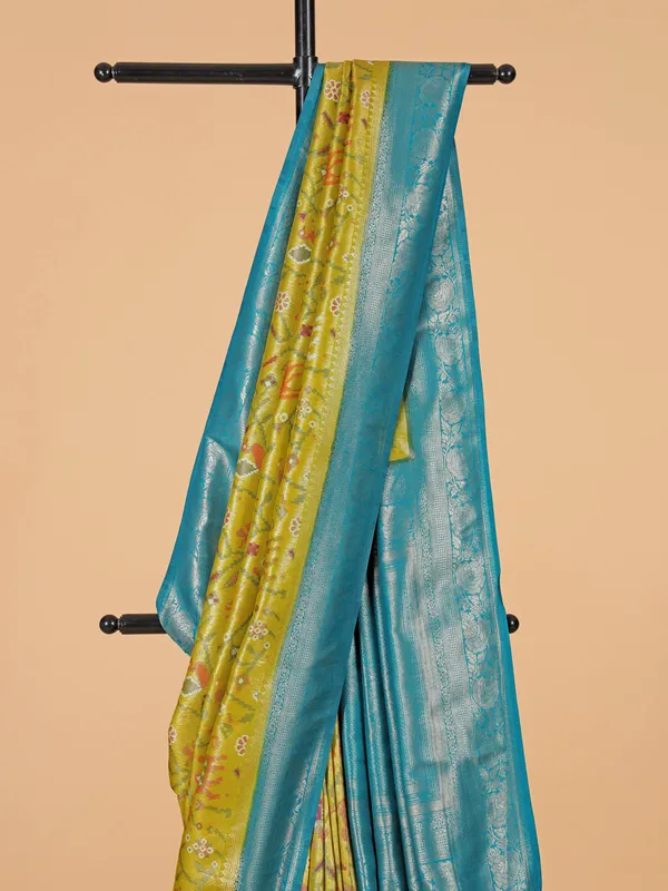 Festive style lime yellow silk saree
