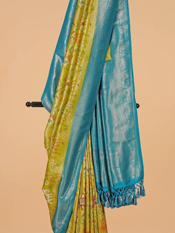 Festive style lime yellow silk saree
