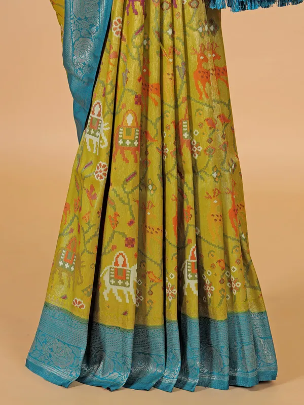 Festive style lime yellow silk saree