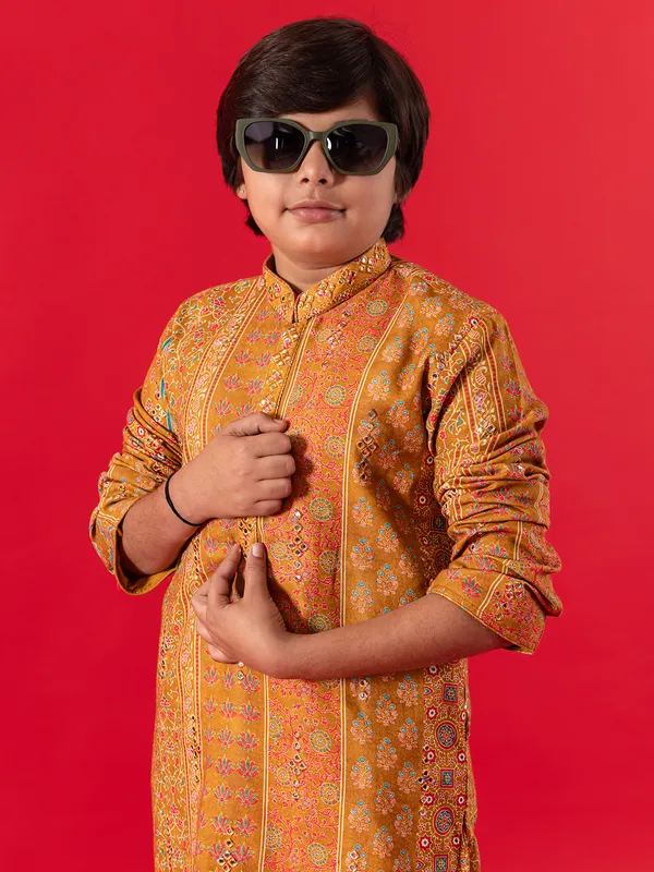 Festive style mustard kurta suit for boys