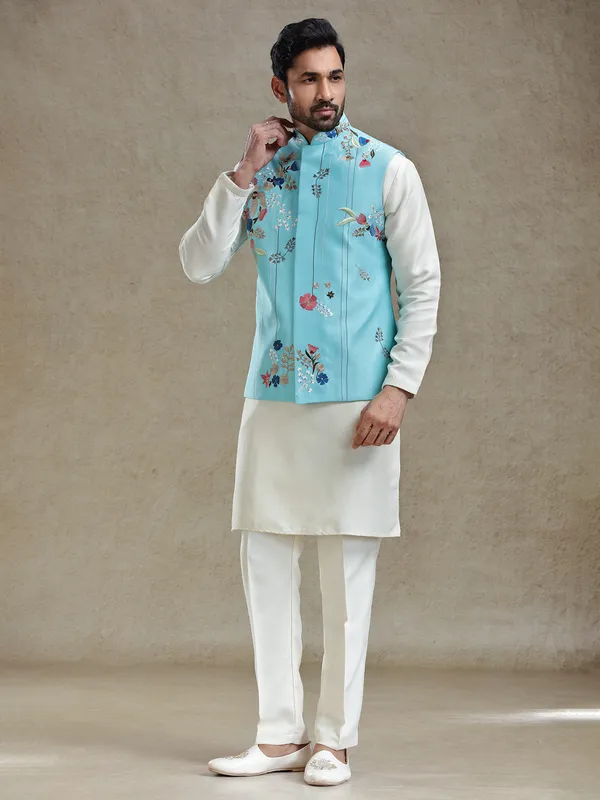Firozi blue linen silk embroideried kurta jacket set