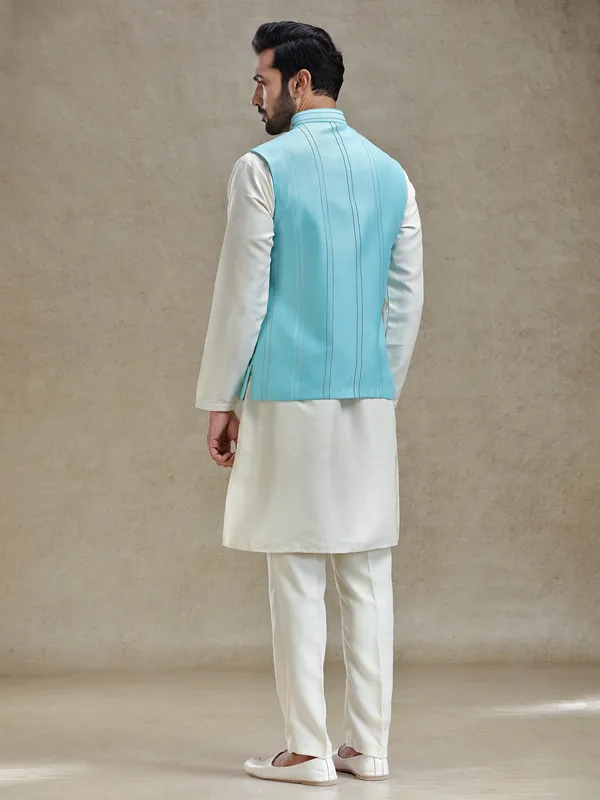 Firozi blue linen silk embroideried kurta jacket set