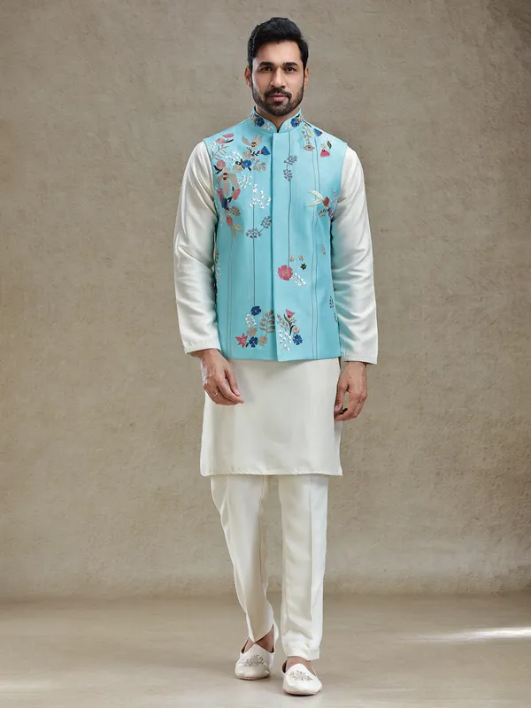 Firozi blue linen silk embroideried kurta jacket set