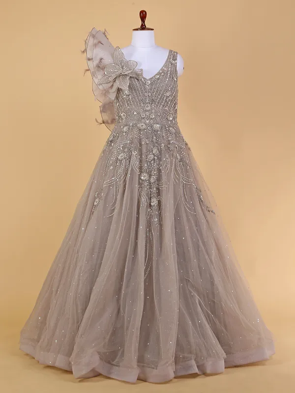Floor length designer beige net gown
