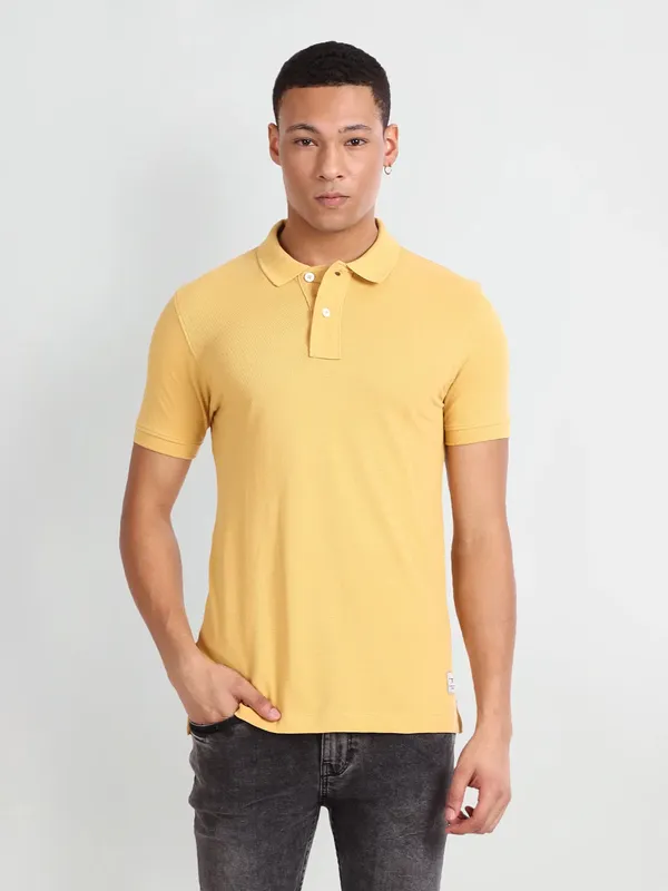 Flying Machine plain yellow polo t shirt