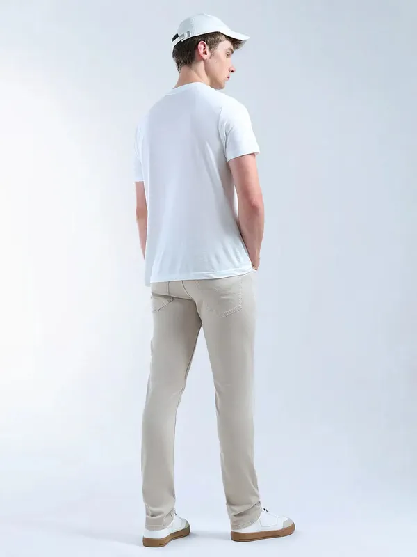 FLYING MACHINE solid beige slim fit denim for men