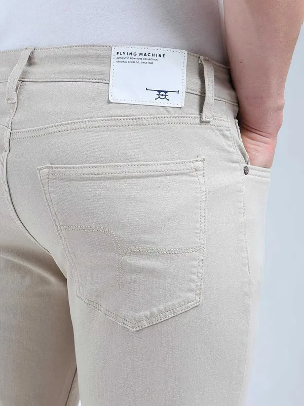 FLYING MACHINE solid beige slim fit denim for men