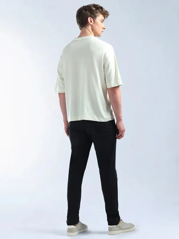 FLYING MACHINE solid black tapered fit jeans for men