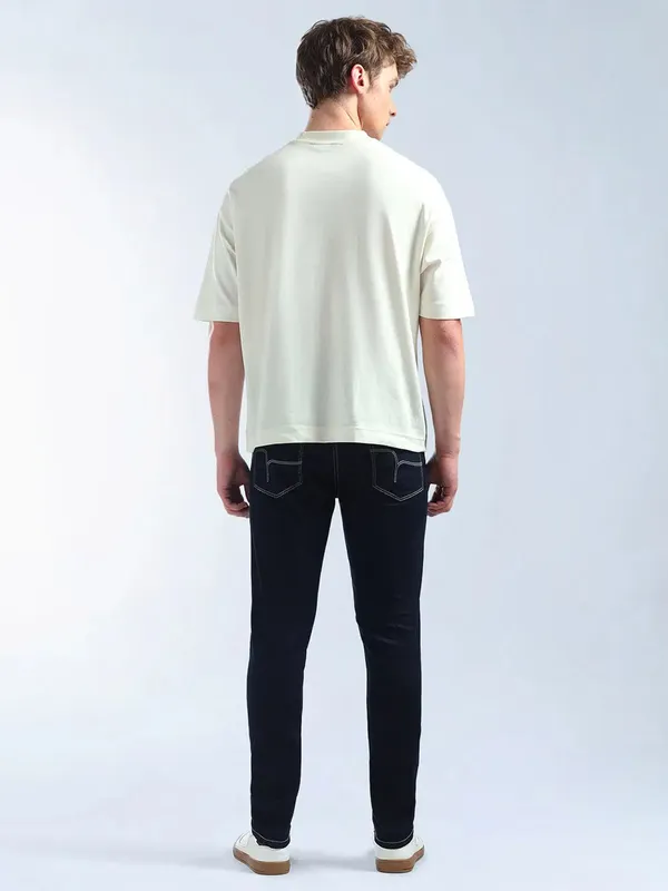 FLYING MACHINE solid dark navy slim tapered denim