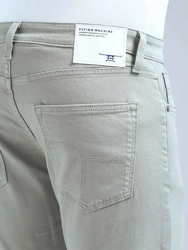 FLYING MACHINE solid light olive slim tapered denim