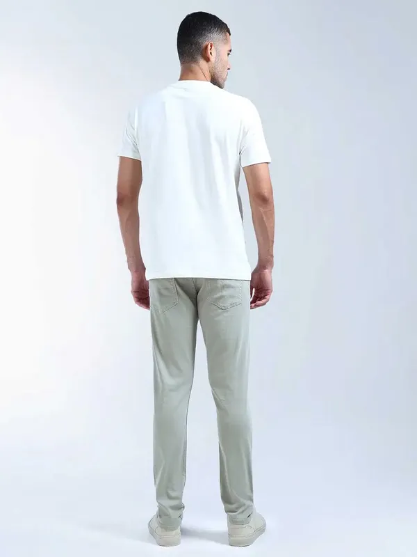 FLYING MACHINE solid light olive slim tapered denim