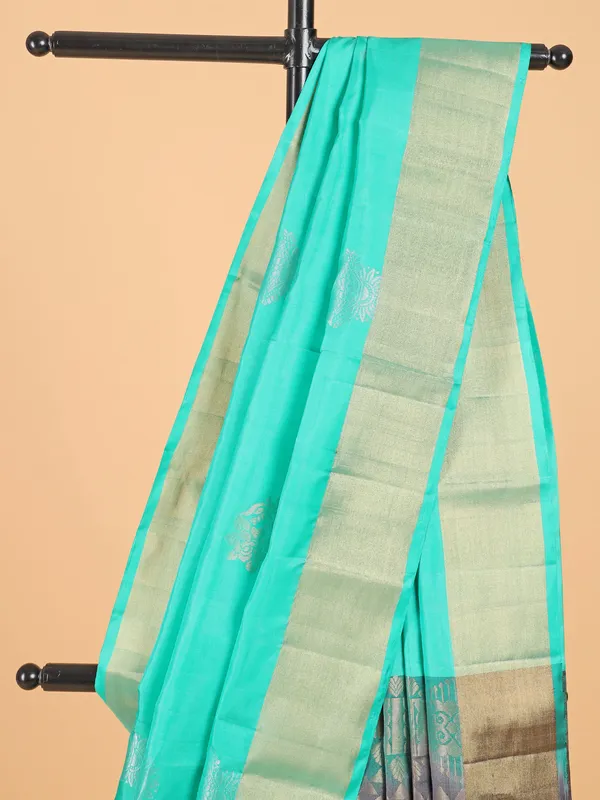 Fresh aqua silk saree for festive look