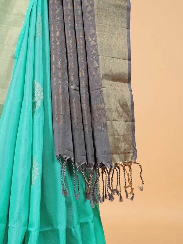 Fresh aqua silk saree for festive look