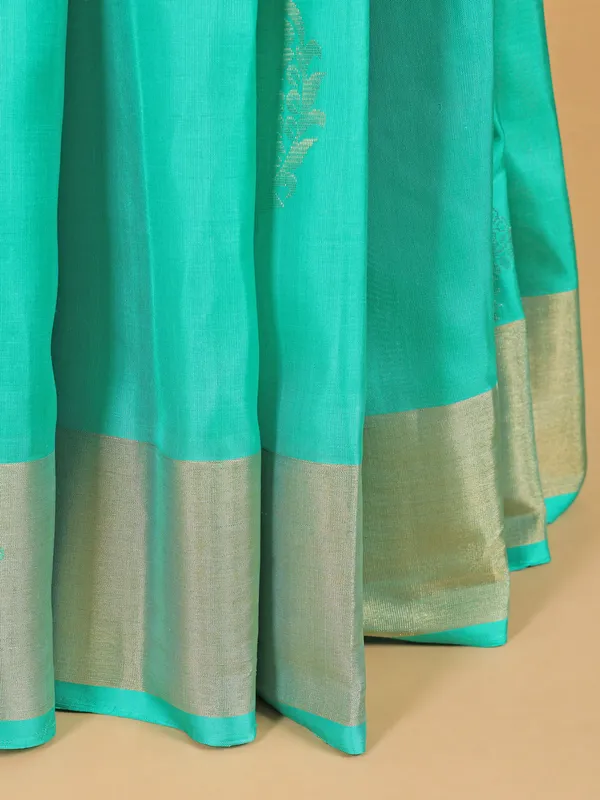 Fresh aqua silk saree for festive look