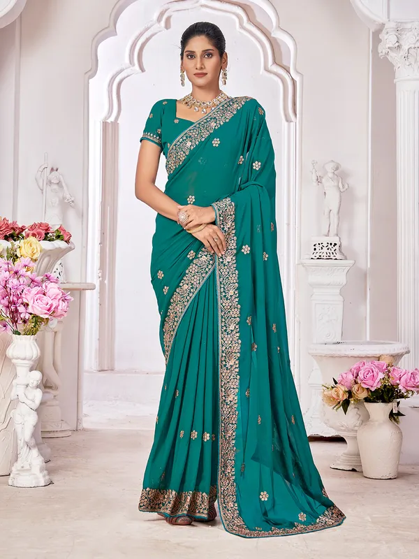 Georgette teal green saree with embroidery