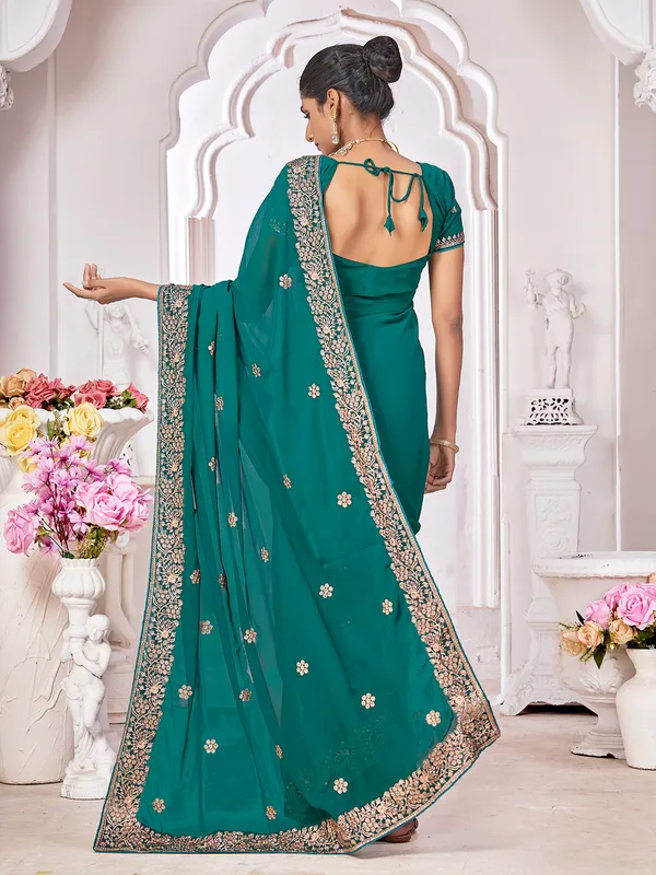 Georgette teal green saree with embroidery