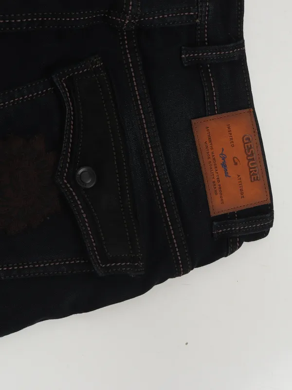 GESTURE washed black denim jeans