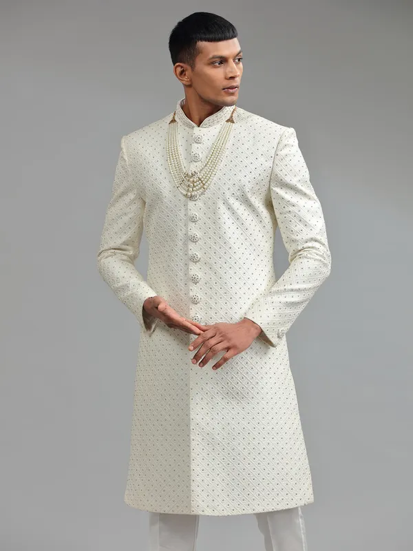 Glamorous silk white groom sherwani