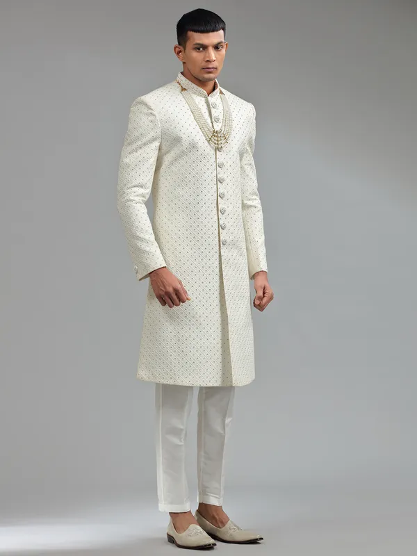 Glamorous silk white groom sherwani