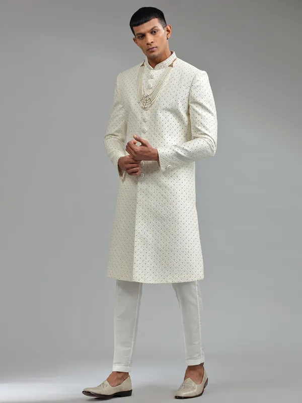 Glamorous silk white groom sherwani