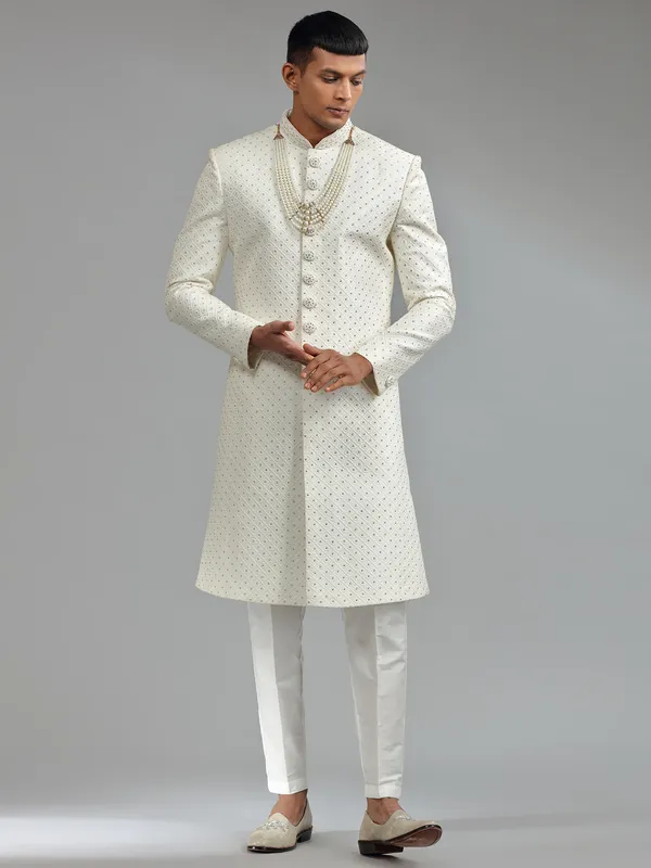 Glamorous silk white groom sherwani