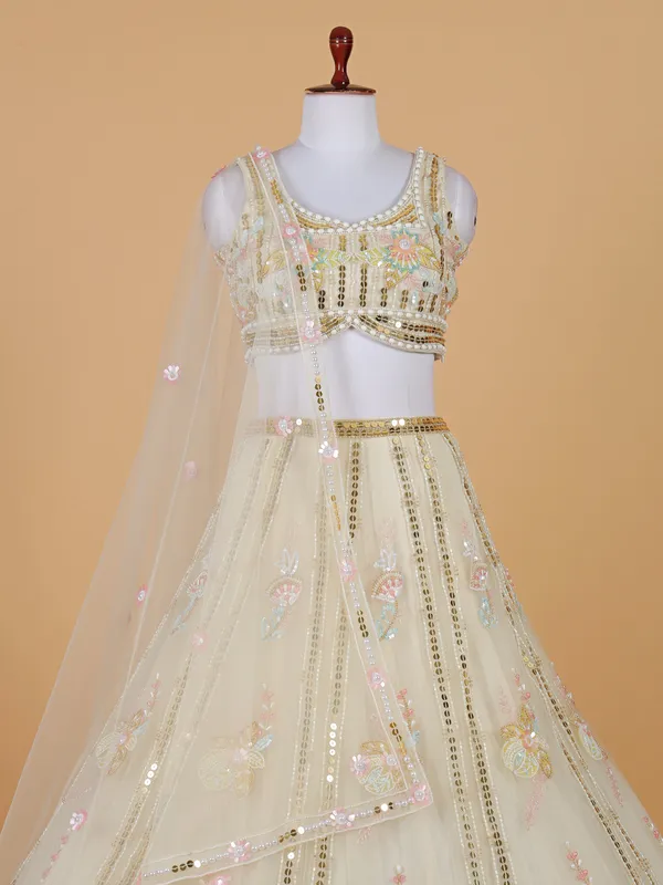 Glorious gold net lehenga choli with sequins work