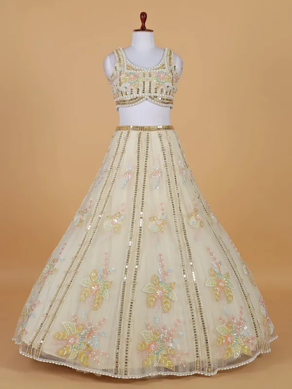 Glorious gold net lehenga choli with sequins work