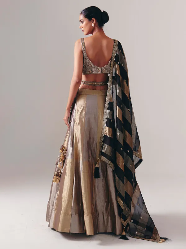 Gold and silver silk designer lehenga choli with dupatta