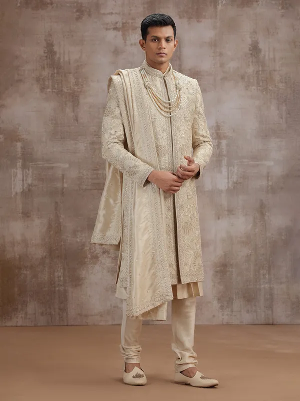 Gold art silk peshwai sherwani with dupatta for wedding
