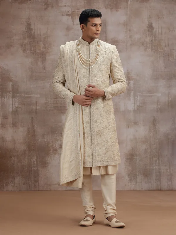 Gold art silk peshwai sherwani with dupatta for wedding