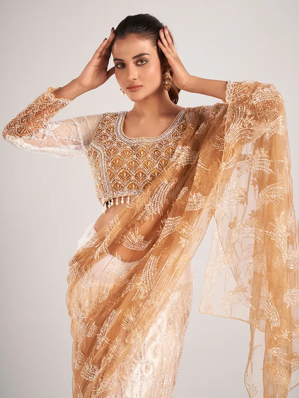 Gold net with stylish designer saree for wedding