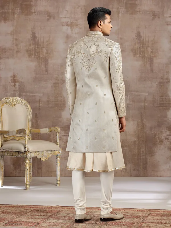 Gold silk peshwai sherwani with classic craftsmanship