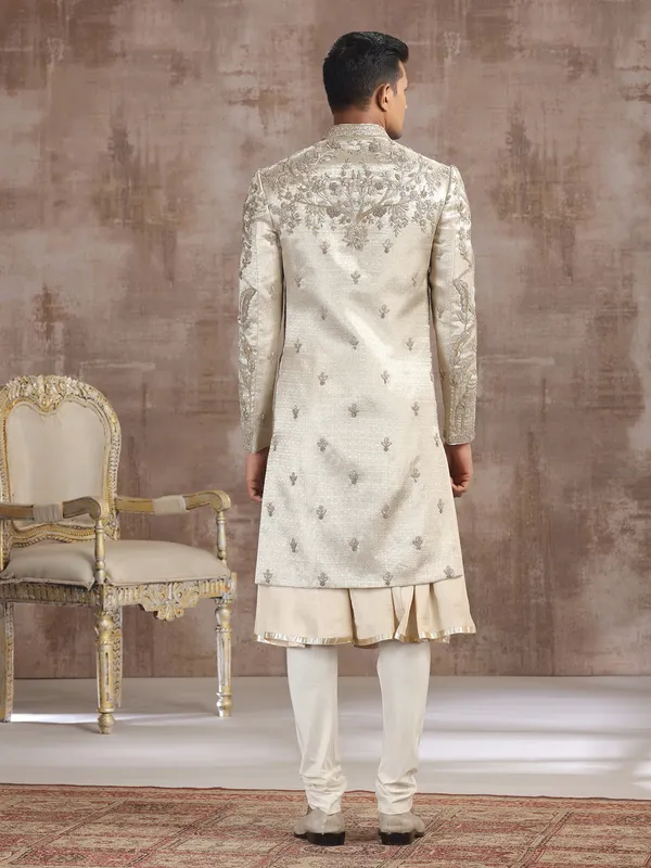 Gold silk peshwai sherwani with diamond embellishments