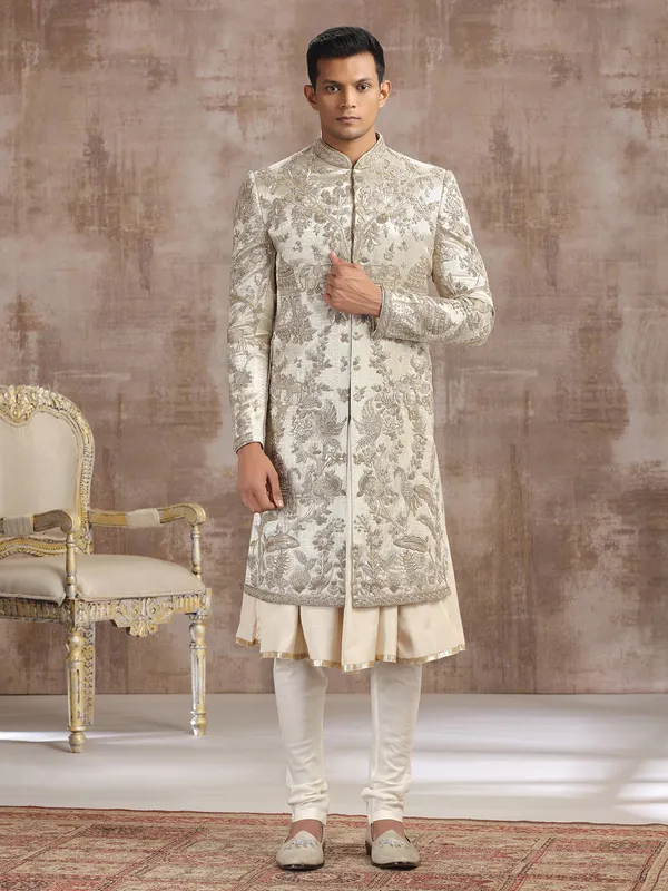 Gold silk peshwai sherwani with diamond embellishments