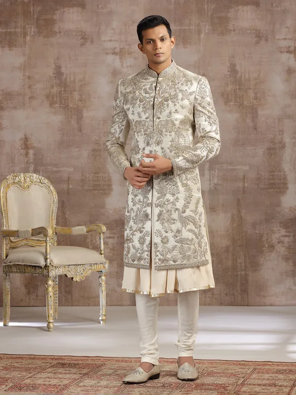 Gold silk peshwai sherwani with diamond embellishments