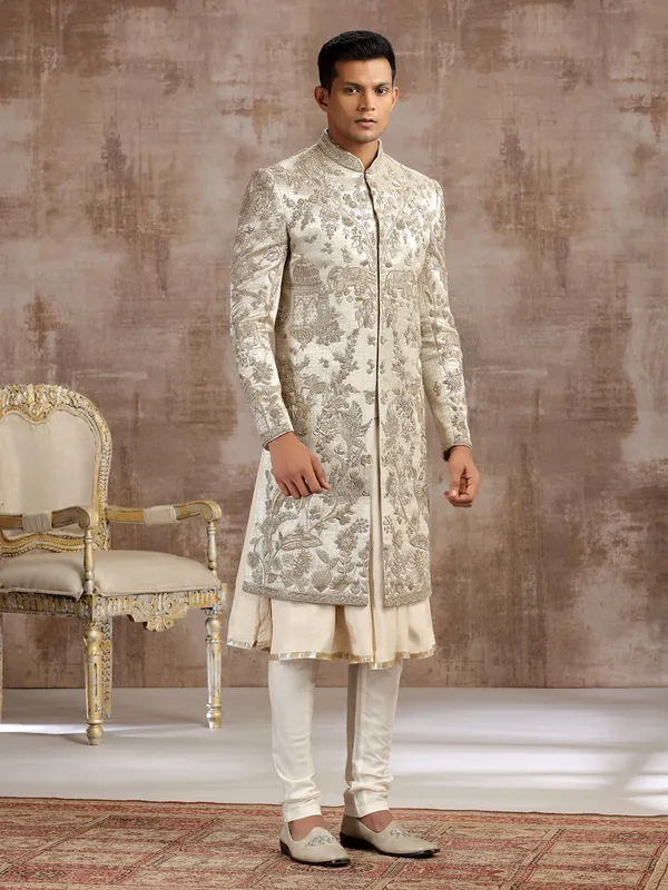 Gold silk peshwai sherwani with diamond embellishments