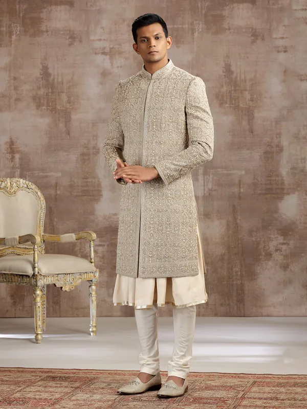 Gold silk peshwai sherwani with subtle shine