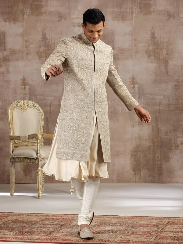 Gold silk peshwai sherwani with subtle shine