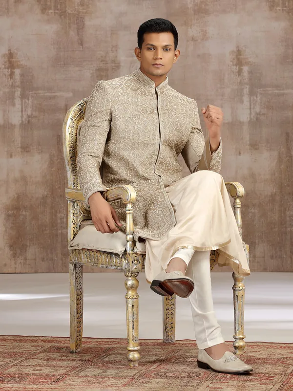Gold silk peshwai sherwani with subtle shine