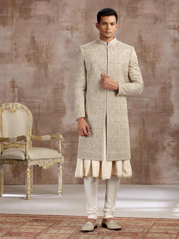 Gold silk peshwai sherwani with subtle shine