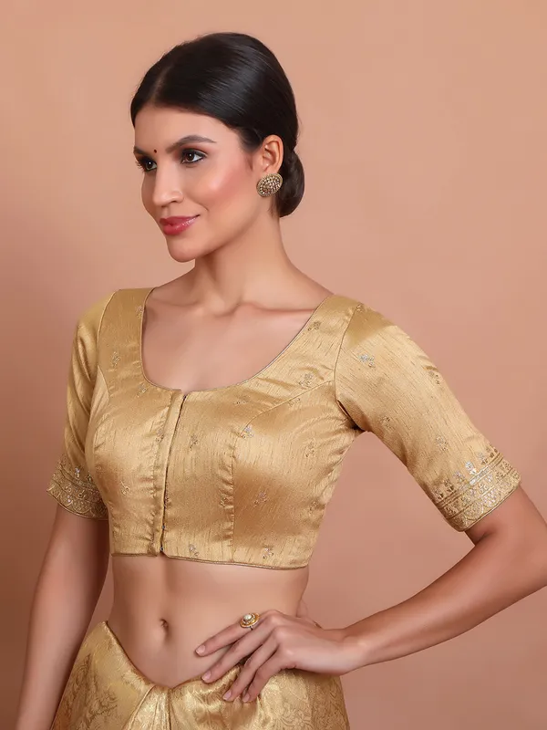 Gold silk round neck blouse with embroidered work