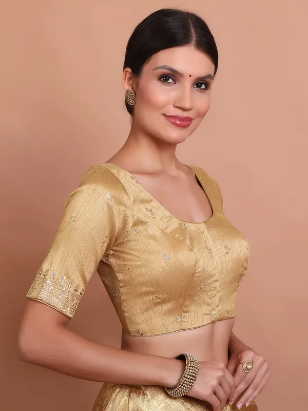 Gold silk round neck blouse with embroidered work