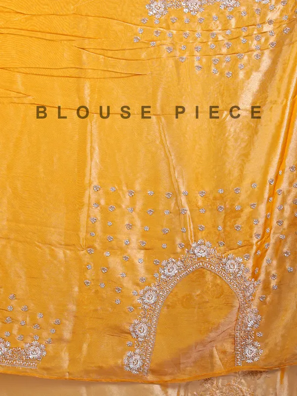 Gold silk saree with haldi perfect finish