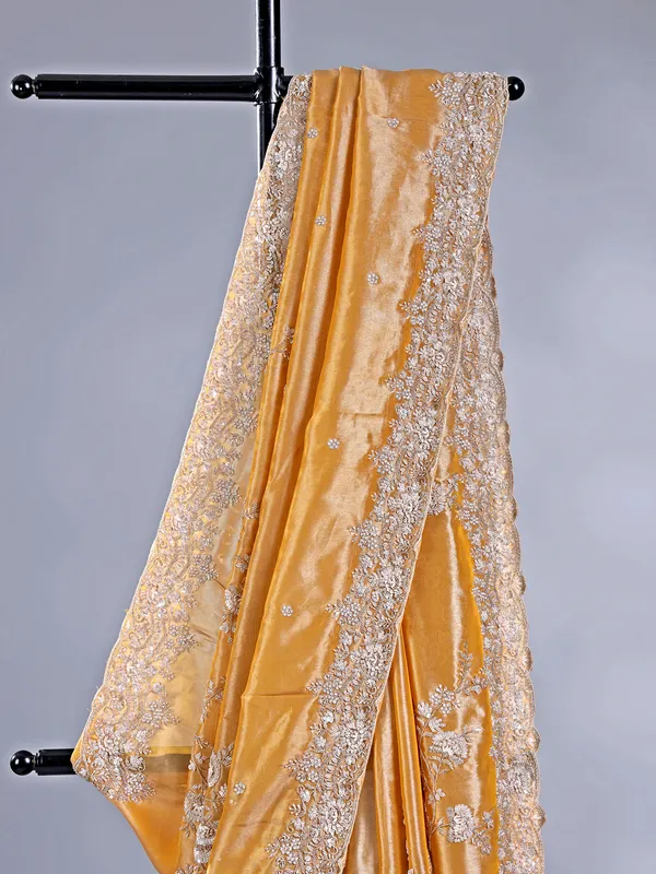Gold silk saree with haldi perfect finish