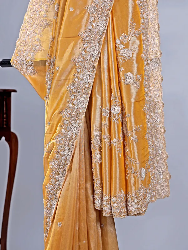 Gold silk saree with haldi perfect finish